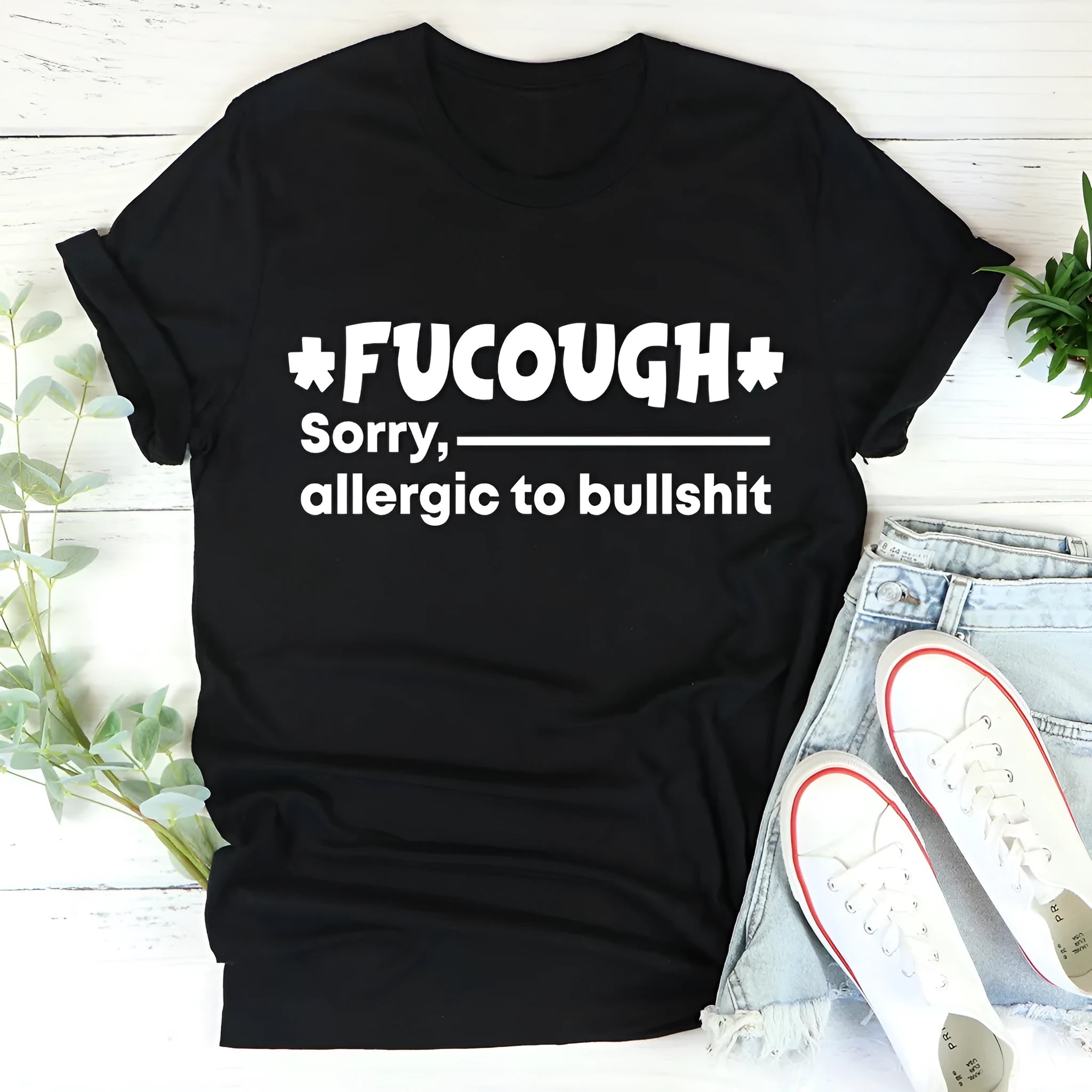 Black unisex cotton summer T-shirt with a round neck and short sleeves on a hanger.