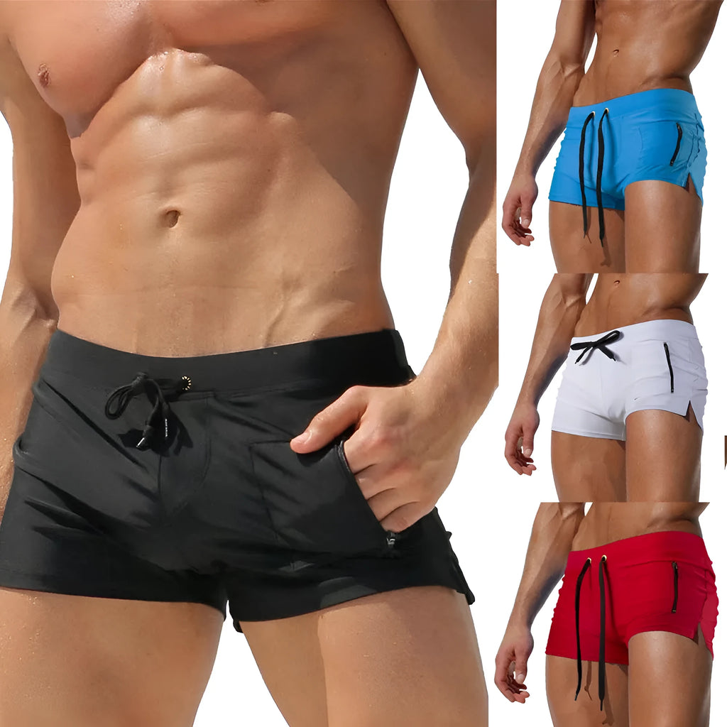 Men's solid colour high waist swimming trunks with a lace-up front closure, shown in black.