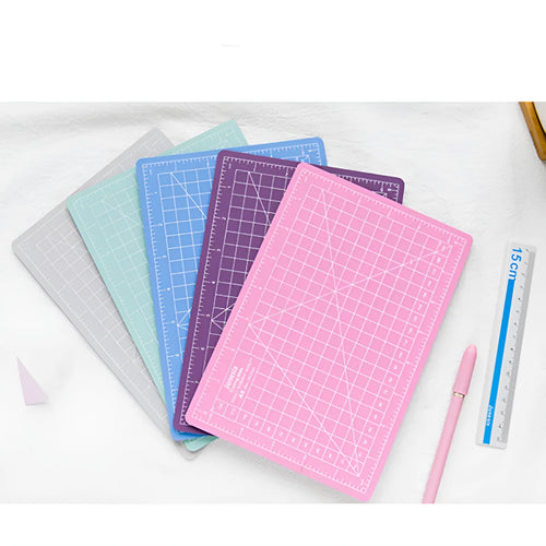 Art pen knife cutting board set with backing board, ruler, sharpener and blade in blue, green, grey, pink or purple