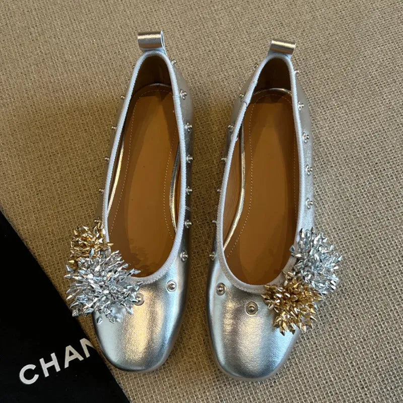 Silver DIY flower rivet Mary Jane shoes with a buckle, showing the round toe and flat rubber sole.