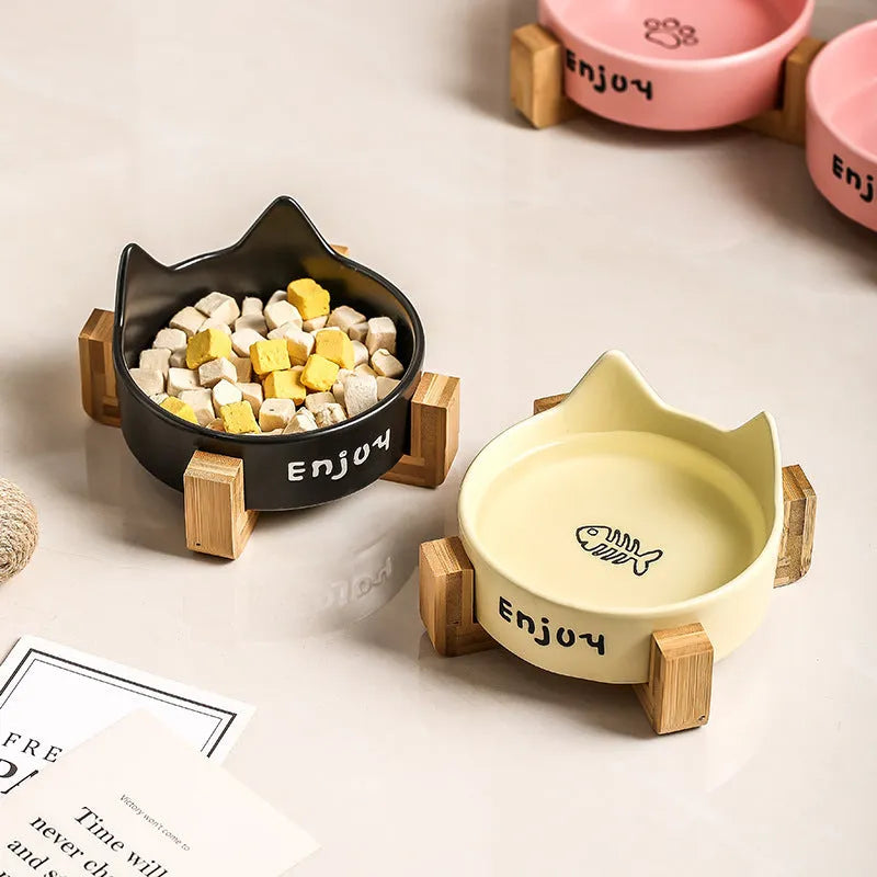 Porcelain cat bowl with wooden anti-tumble frame in cat ear design