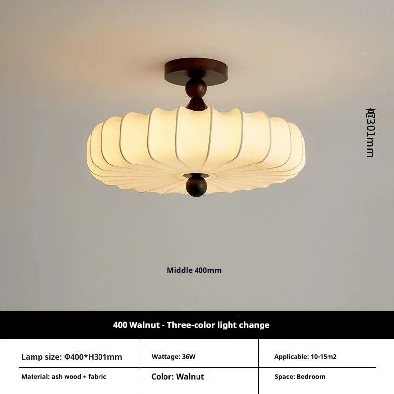 Mid-ancient French retro fabric ceiling lamp with ash wood frame in walnut colour on a ceiling