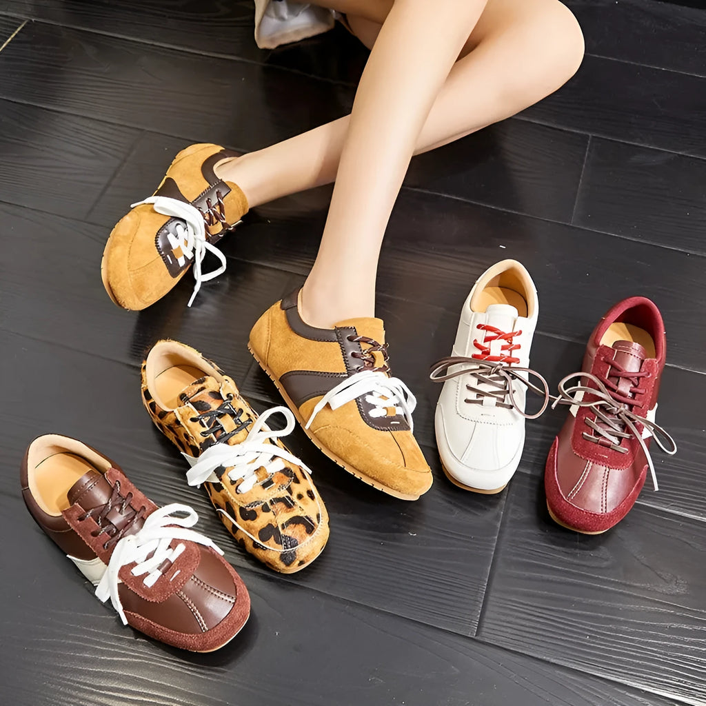 White women's lace-up casual sneakers with horse fur flocking texture, flat heel, and round toe.