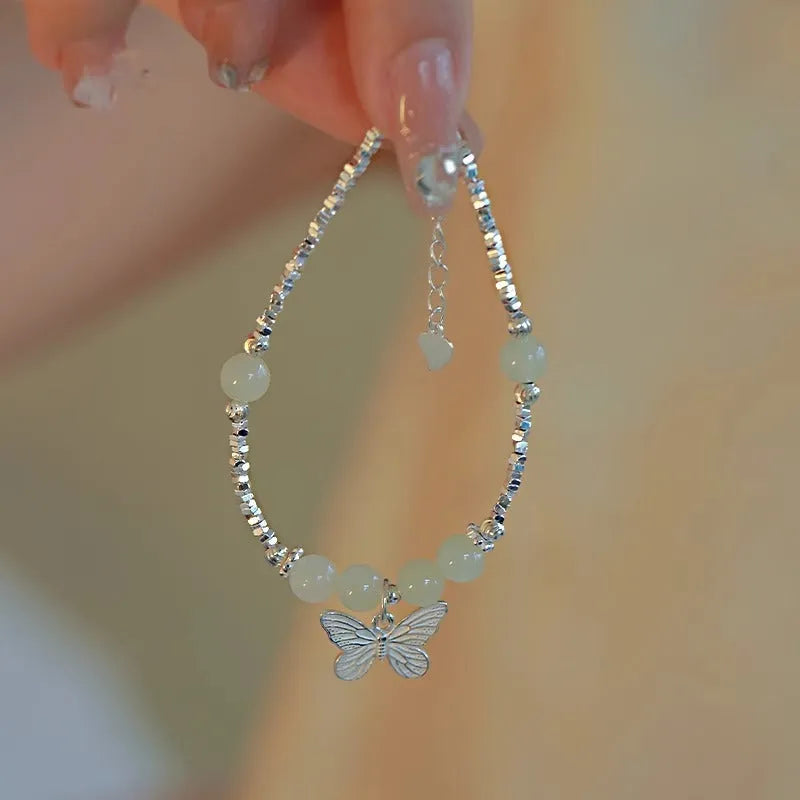 Women's Hetian jale and silver butterfly jewellery set with matching bracelet and necklace