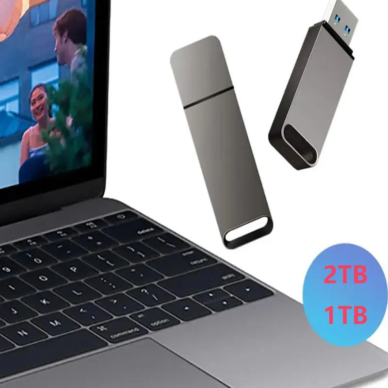Customisable metal USB flash drive in black, red, or silver, showing high-capacity options from 1TB to 16TB.