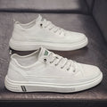 Men's beige casual flat shoes with round toe and low heel on a white background.