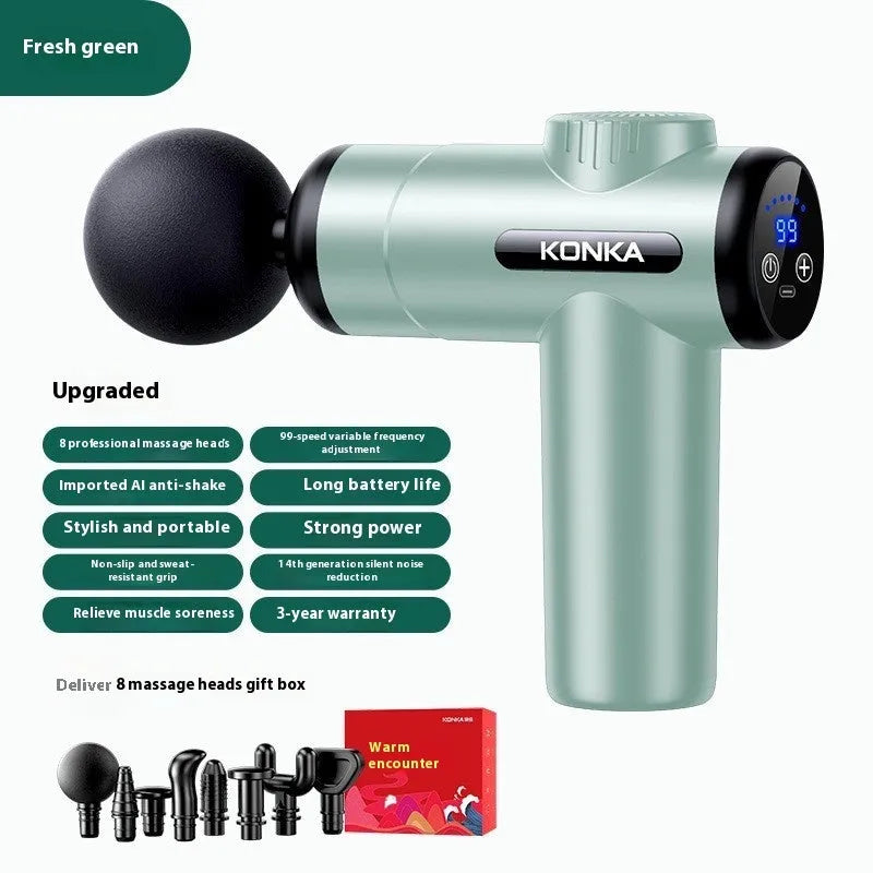 Konka V19 grey professional electric massage gun with multiple silicone massage heads on a table