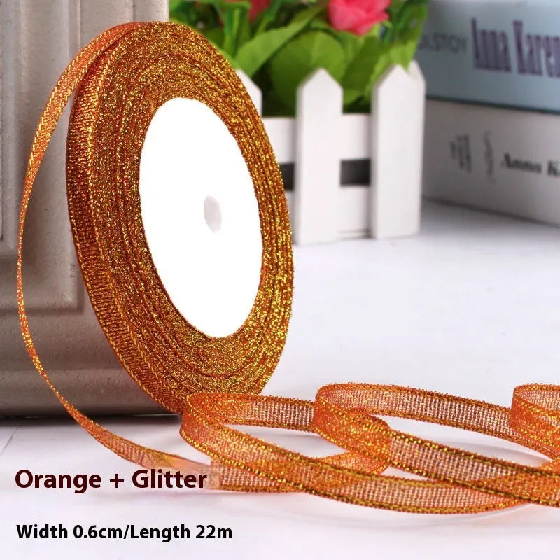 0.6cm wide polyester gift packaging ribbon roll in multiple colour options including gold leaf and jade pink