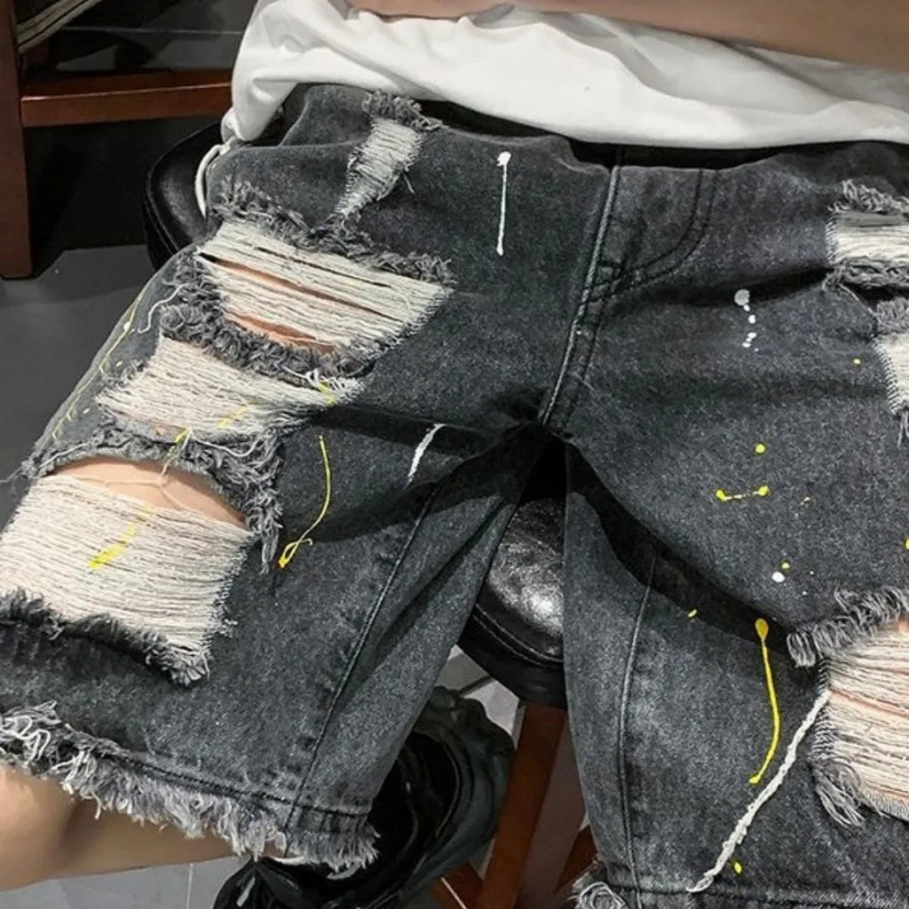 Men's black water washed hole denim shorts with loose fit and casual street style