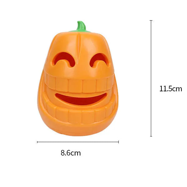 Orange Halloween pumpkin-shaped dog chew toy with a treat-dispensing funnel hole.