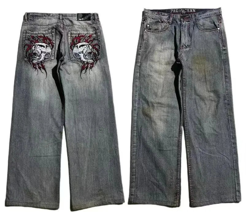 Grey washed-out men's wide-leg jeans with a retro worn look on a mid waist.