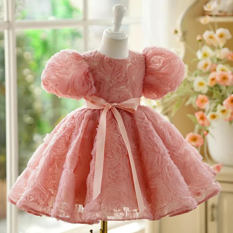 Children's girls' bean pink polyester pettiskirt birthday dress with lining, side view