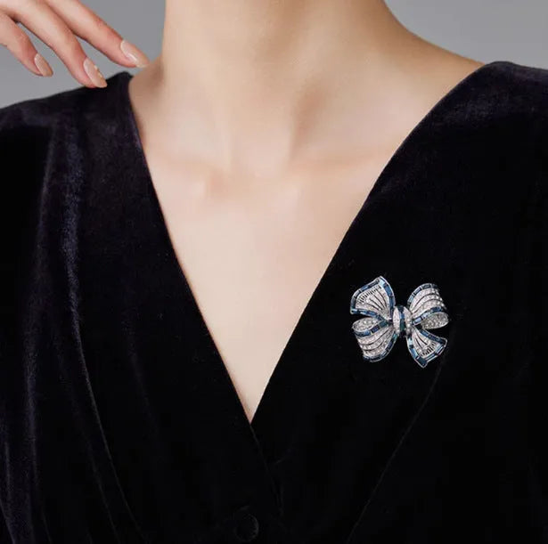 Purplish red or blue bow-shaped alloy brooch for women