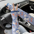 Printed ice silk fabric sun protection oversleeve gloves in a leaf and flower pattern.