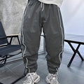Men's loose-fit casual cropped trousers in bamboo fibre, shown in Army Green colour.