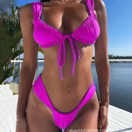 Women's solid colour lace-up bikini swimsuit in nylon, shown in multiple colour options.