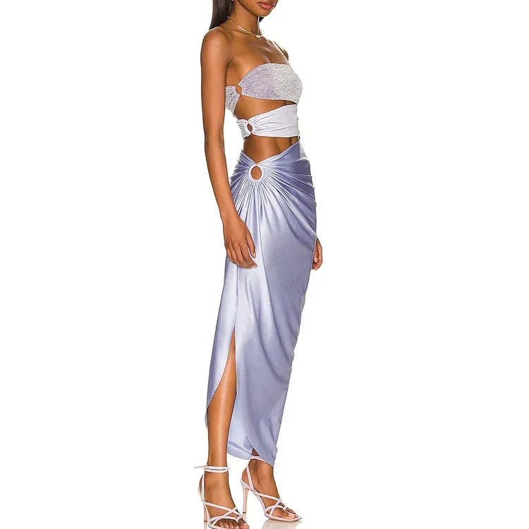 Purple one-piece swimsuit with a matching wrap skirt on a mannequin.