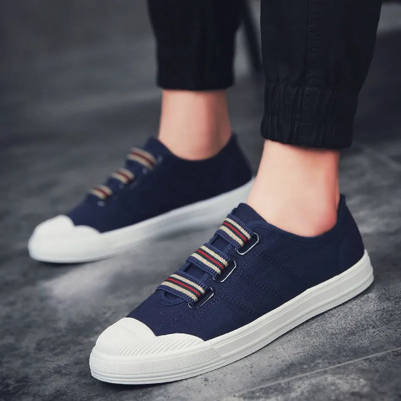 Men's low top canvas casual shoes with rubber sole in black, red or white, sizes 38-44