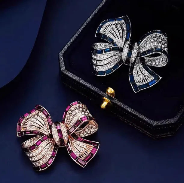 Purplish red or blue bow-shaped alloy brooch for women