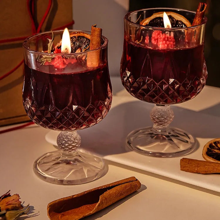 Scented candle in a glass wine goblet with translucent jelly crystal wax and French mulled wine label.