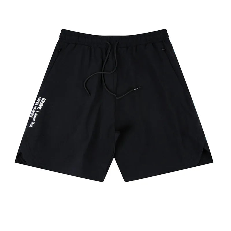 Man wearing thin black quick-dry running shorts made of nylon and spandex for sports.