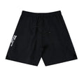 Man wearing thin black quick-dry running shorts made of nylon and spandex for sports.