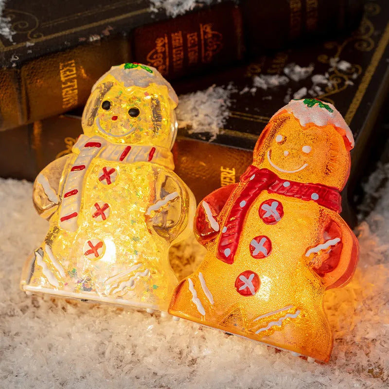 Glowing Christmas gingerbread man snowman ornament with a red scarf, plastic decoration.
