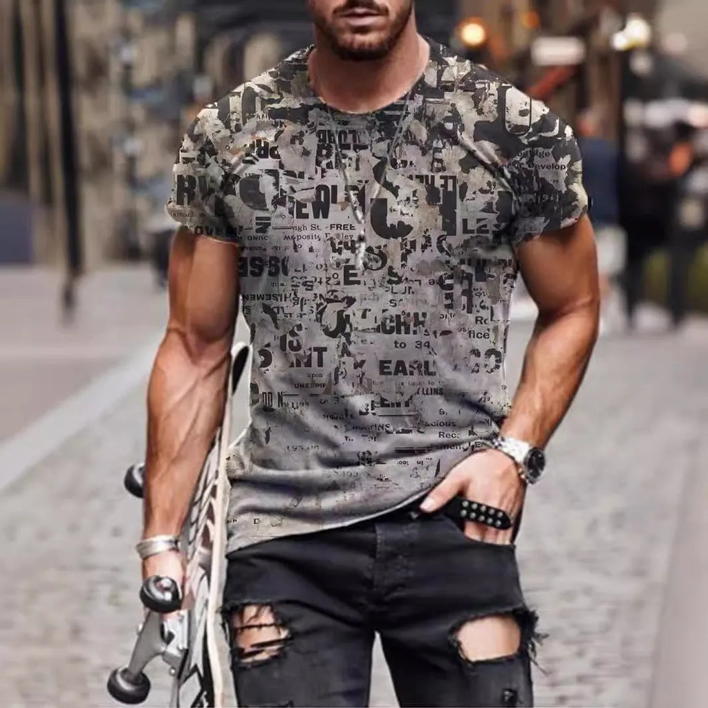Man wearing a loose-fit camouflage print short-sleeved t-shirt.