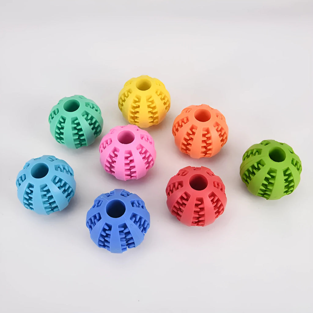Small pink rubber dog chew toy with a 5 cm diameter for molar cleaning and self-entertainment