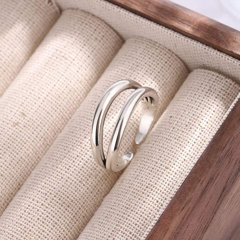 Women's retro copper double layer hollow geometry ring with adjustable opening.