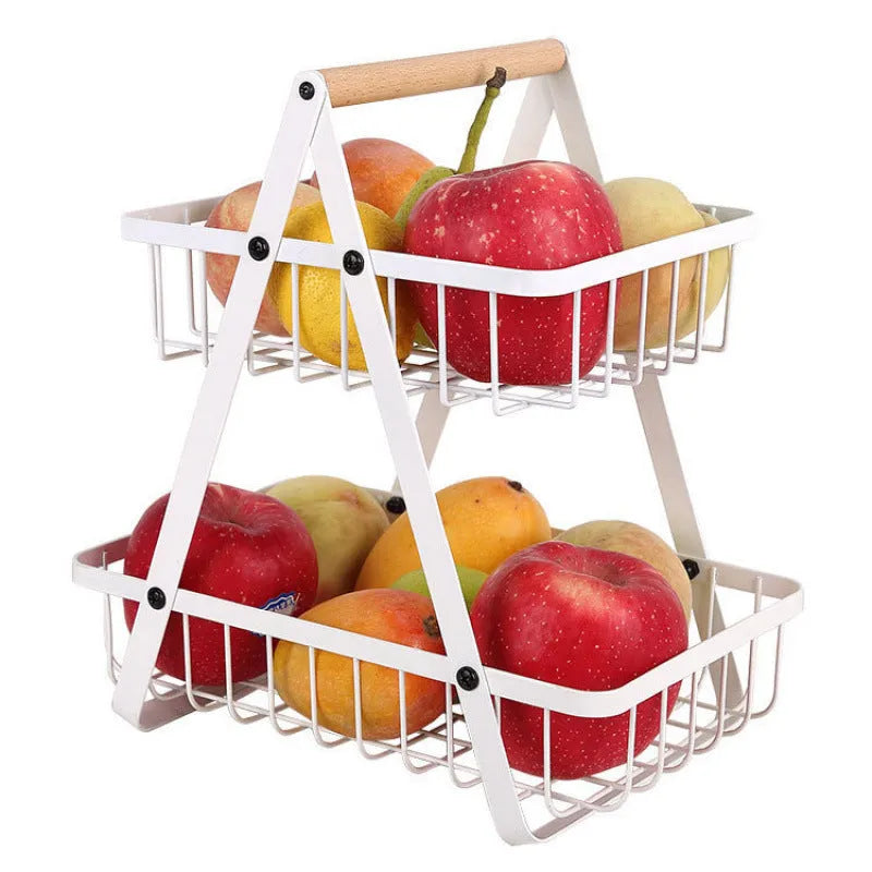 Black detachable double-layer iron fruit basket with wooden handle on tabletop