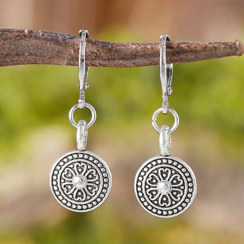 Bohemian retro distressed ethnic earrings with round geometric shape and circular prints