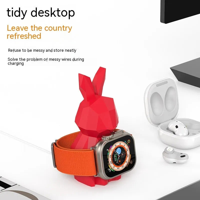 Rabbit-shaped silicone desk charger bracket in white with wrist strap holding a charging cable