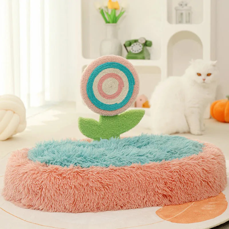 Pink elliptical cat nest bed with thick plush lining and a removable cover