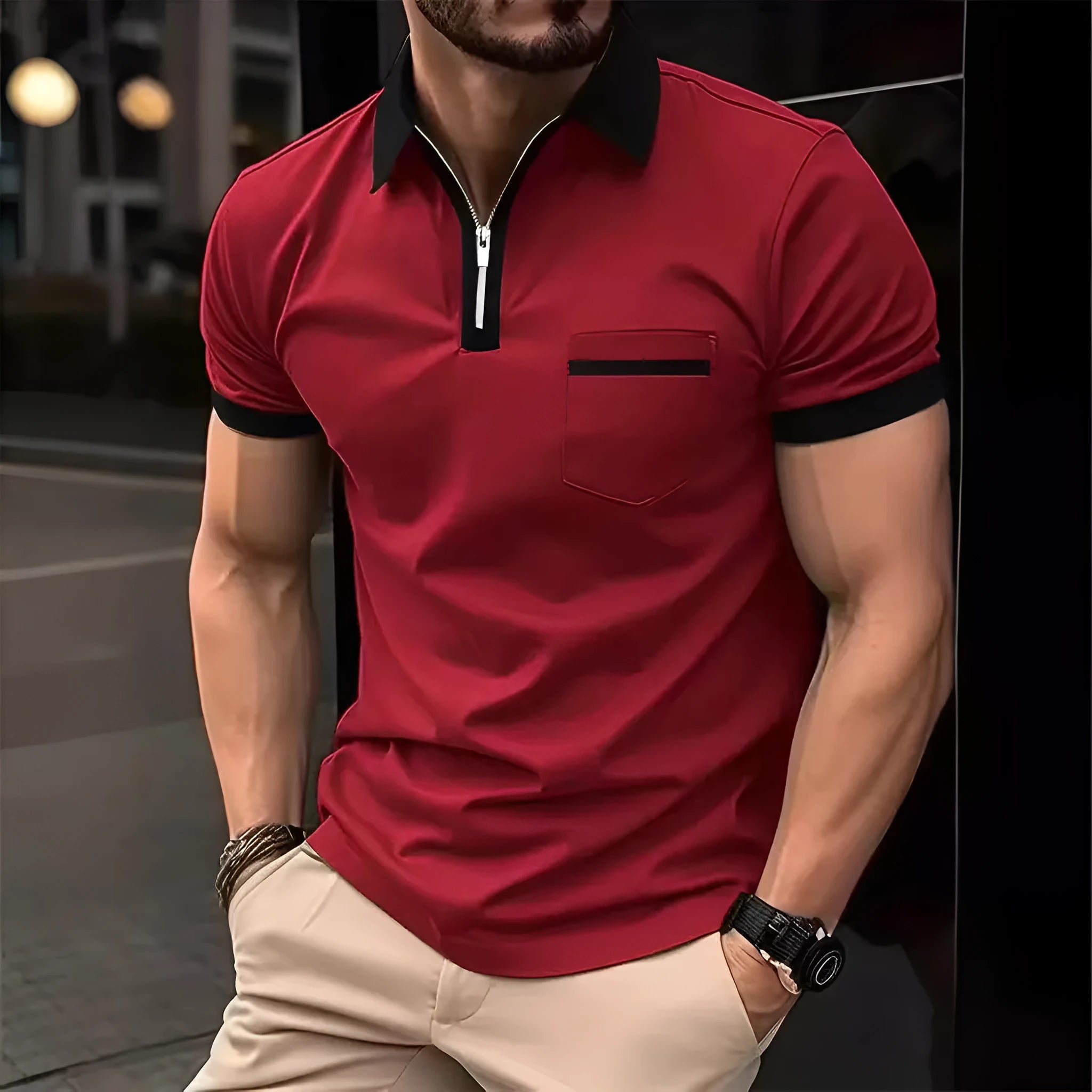 Men's loose fit short sleeve t-shirt with a chest pocket and zip trim on the front.