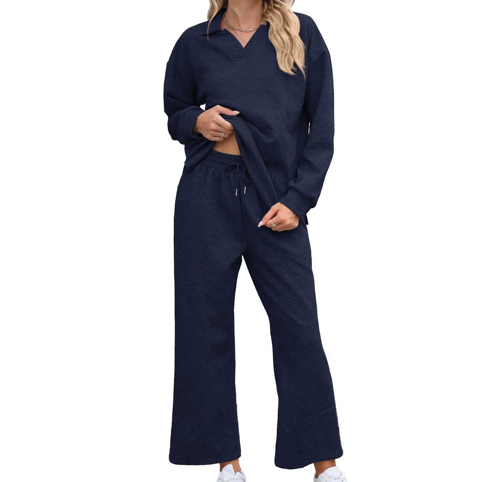 Women's solid colour knitted jacquard suit set with lapel sweater and cropped trousers.
