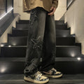 Loose fit cotton denim pants in stone washed light blue with straight leg, front view