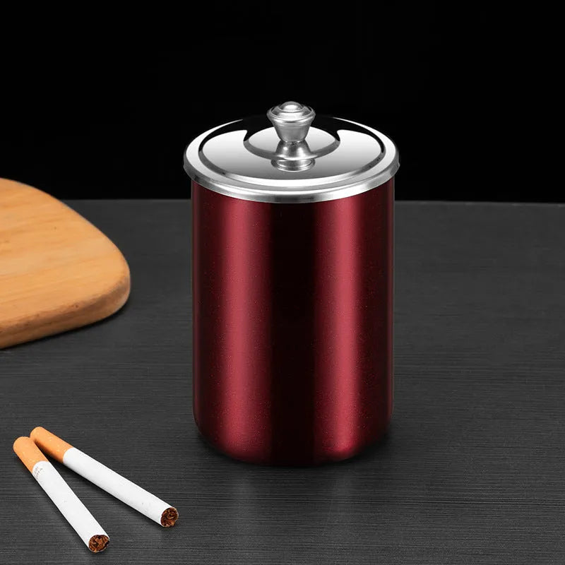 Stainless steel fly ash ashtray with cover measuring 7.5cm by 9.5cm