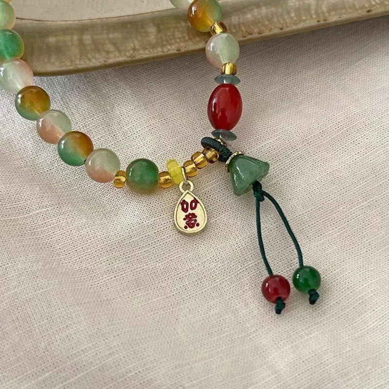 M990 Lotus Ruyi bracelet showing mixed material construction and lotus decorative element