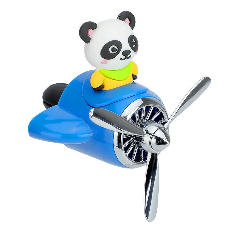 Cartoon small aeroplane shaped plastic car vent aromatherapy clip in black, blue, orange, or pink.