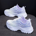 Women's pink satin lace-up casual shoes with round toe on a white background