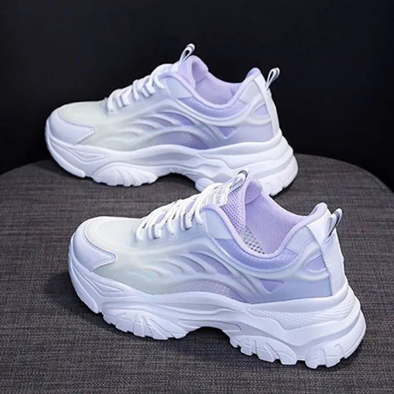 Women's pink satin lace-up casual shoes with round toe on a white background