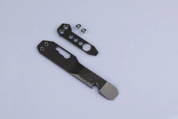 Titanium alloy multi-function crowbar tool with bottle opener and screwdriver, in gun grey finish.