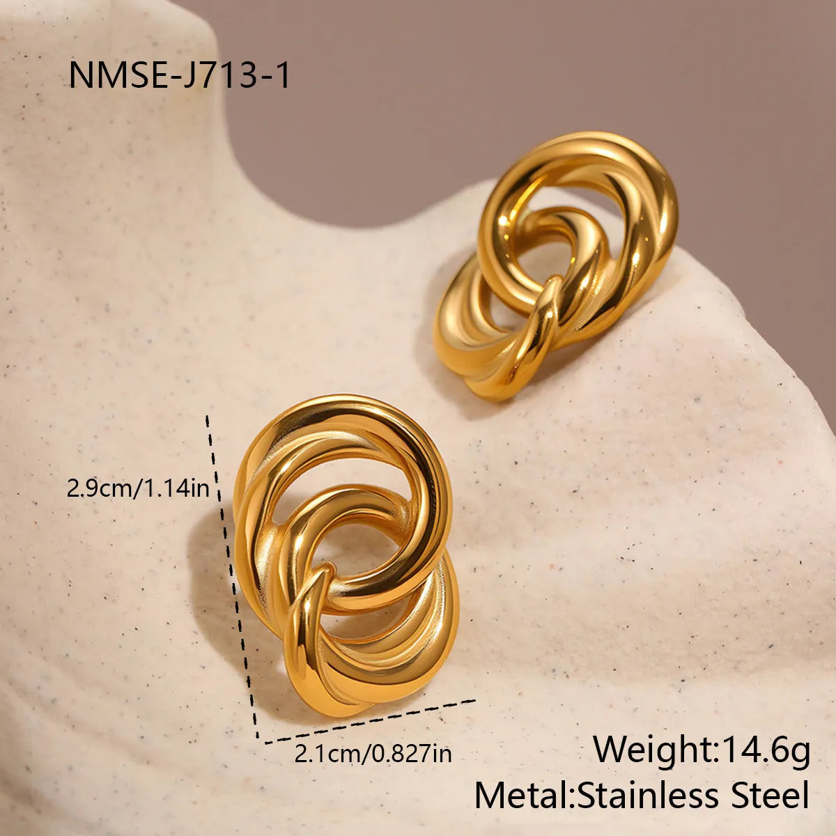 18K gold electroplated stainless steel geometric circle stud earrings on display