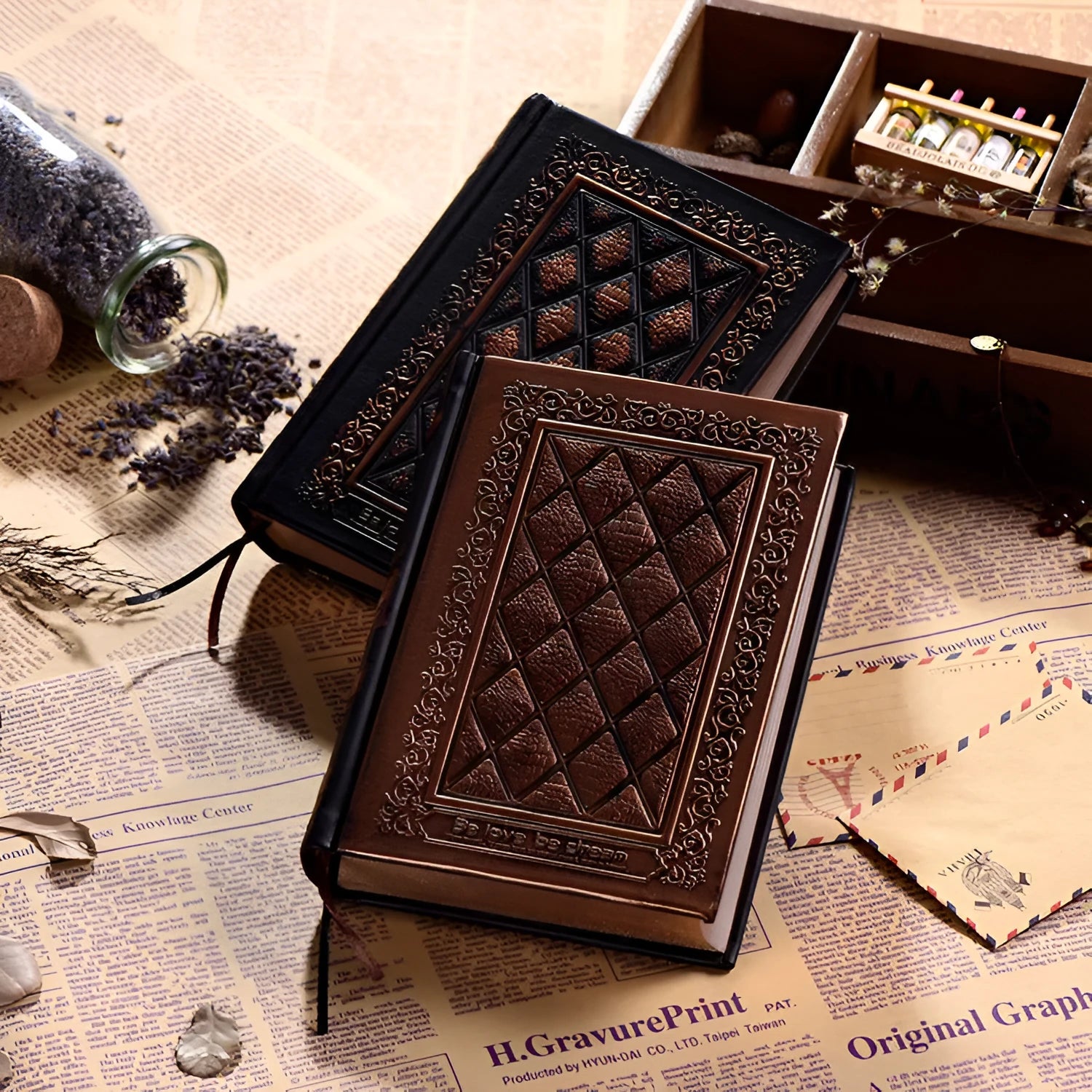 Embossed faux leather notepad in bronze colour with three-dimensional pattern and thick pages