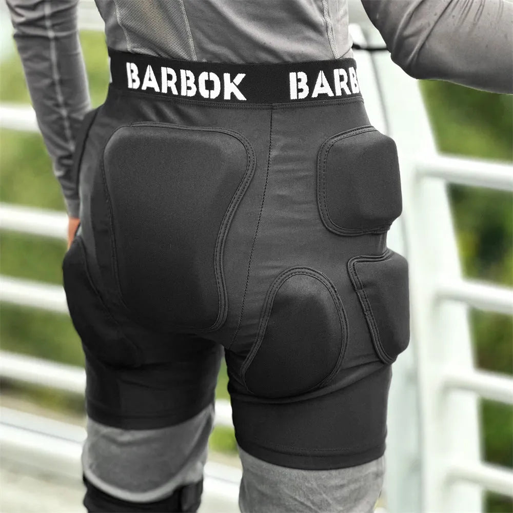 Black adult hip protection pad with NBR padding for skating and skiing safety.