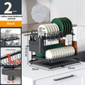White double-layer kitchen storage rack with removable draining tray on top and a lower storage shelf