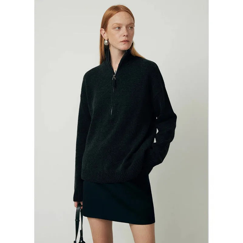 Wool bandage dress with loose lapels and long sleeves in black.