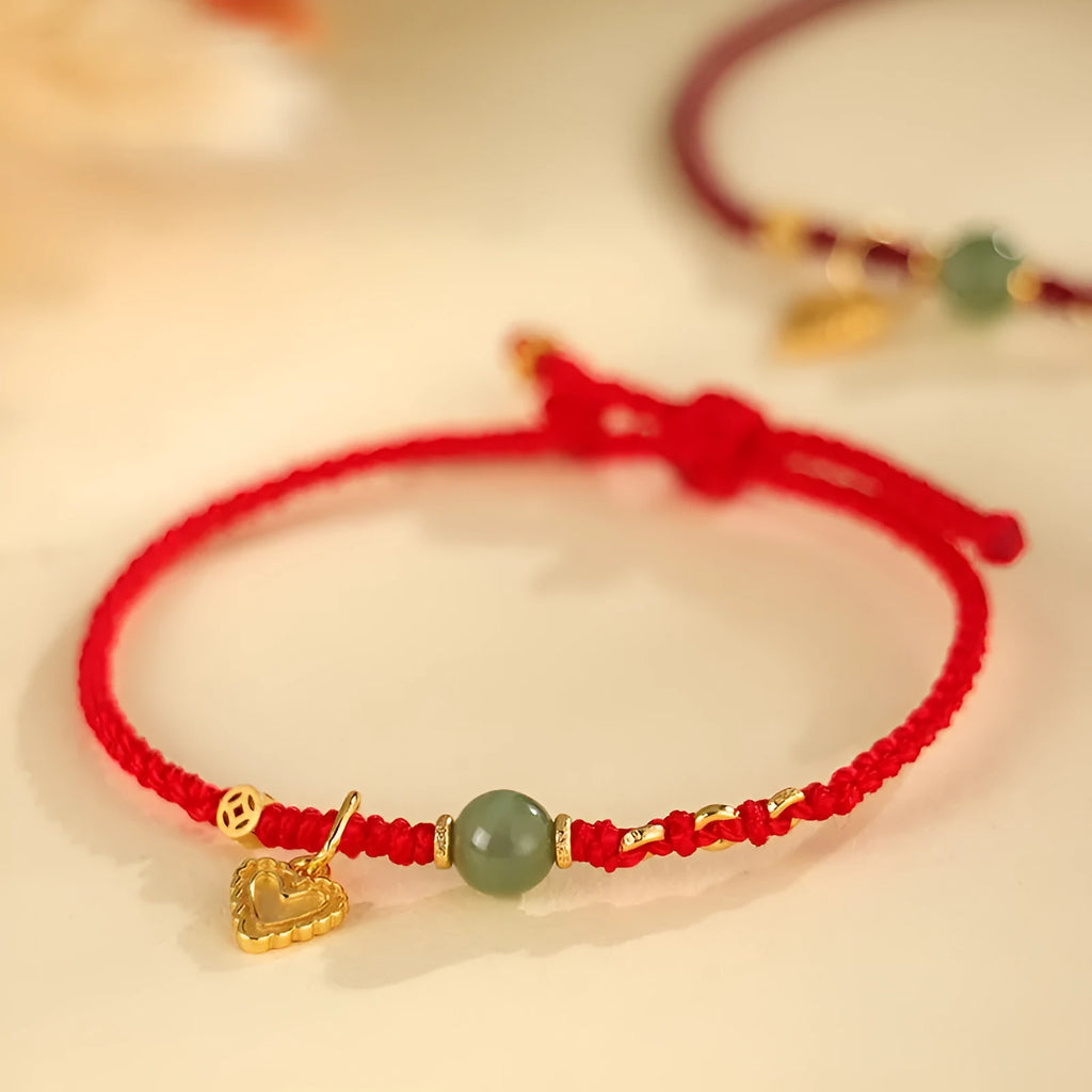 Handmade women's 925 silver and Hetian jade woven bracelet with red carrying strap