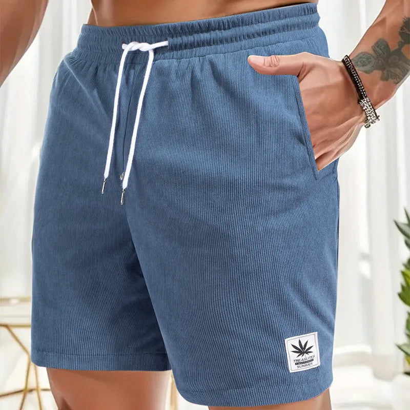 Men's grey drawstring summer shorts with elastic fabric on a mannequin